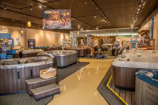 An aisle between hot tubs in the Columbia showroom