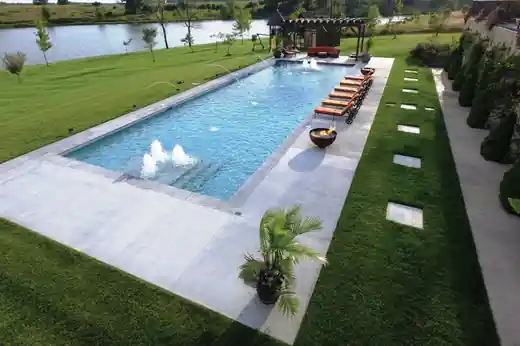 Aerial view of a long pool with a fire bowl