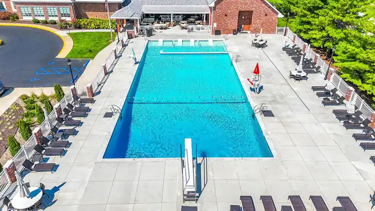 Aerial view of a commercial pool with a diving board