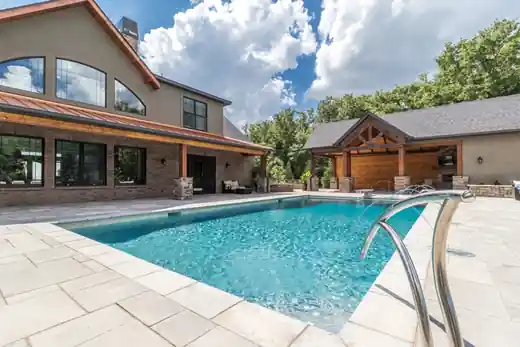 Pool at a stone and timber home